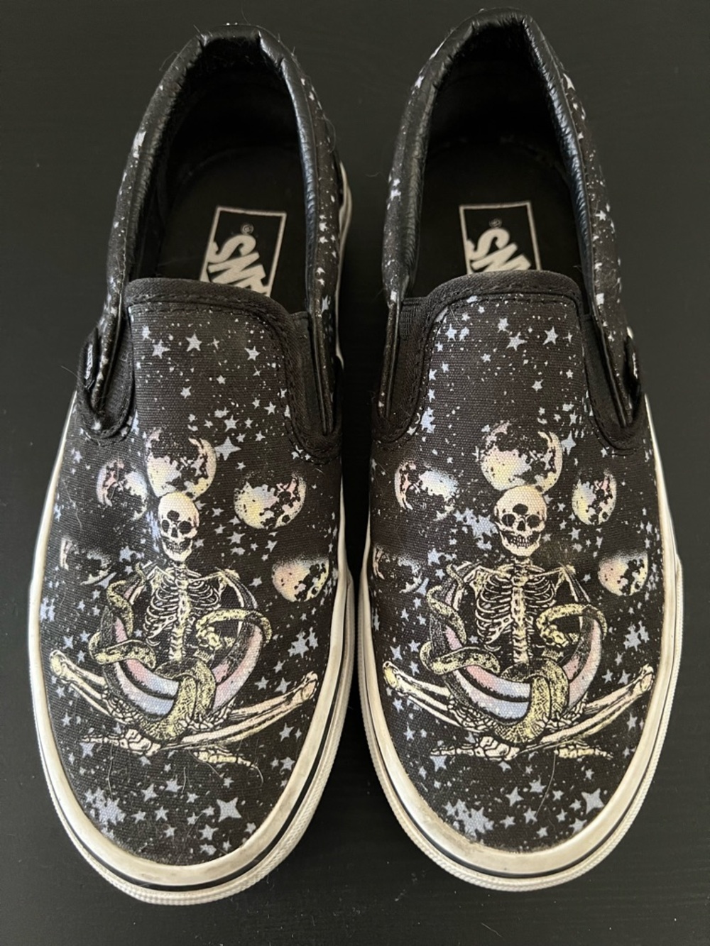 Vans Black Slip-On Skate Shoes with Skeleton Graphic